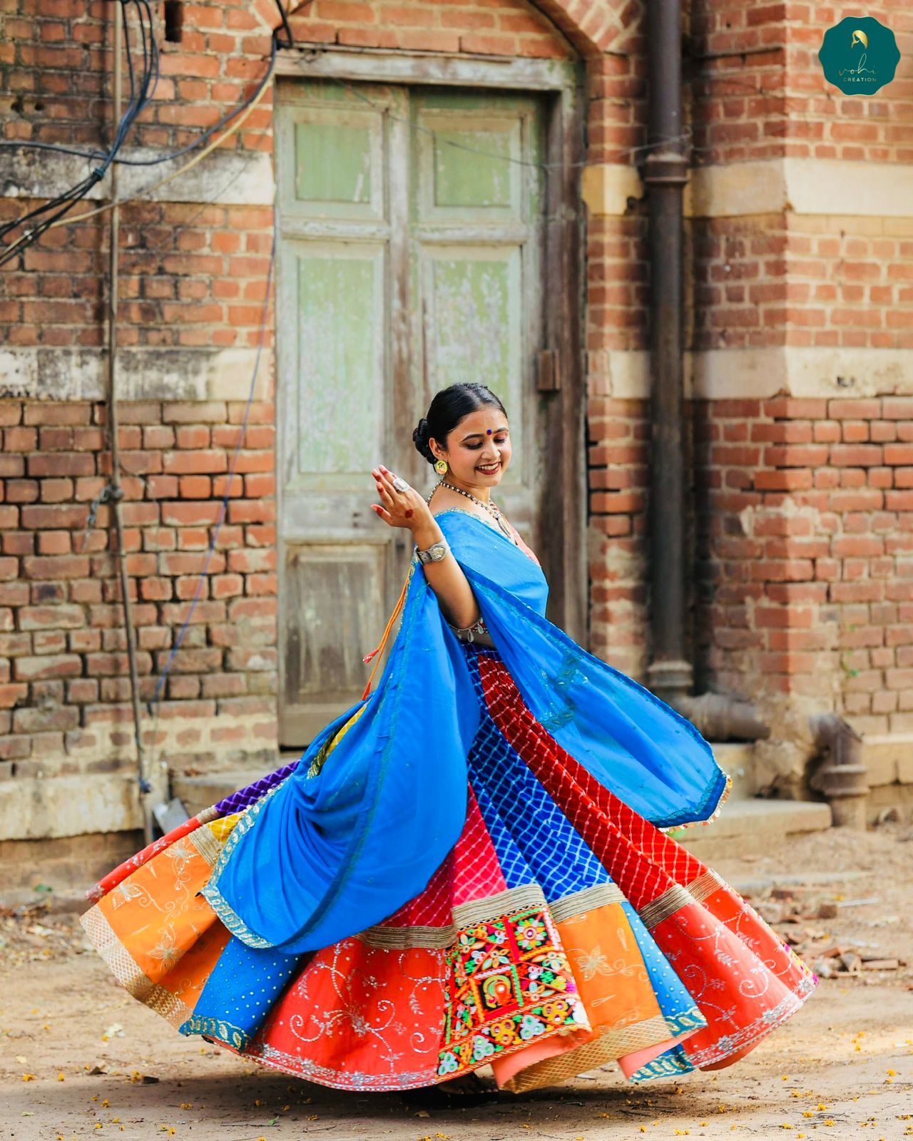 Multi-Colour Lehriya Kutchi Work Lehenga Set with Hand-Embroidered Dupatta | 12-Metre Grand Flare